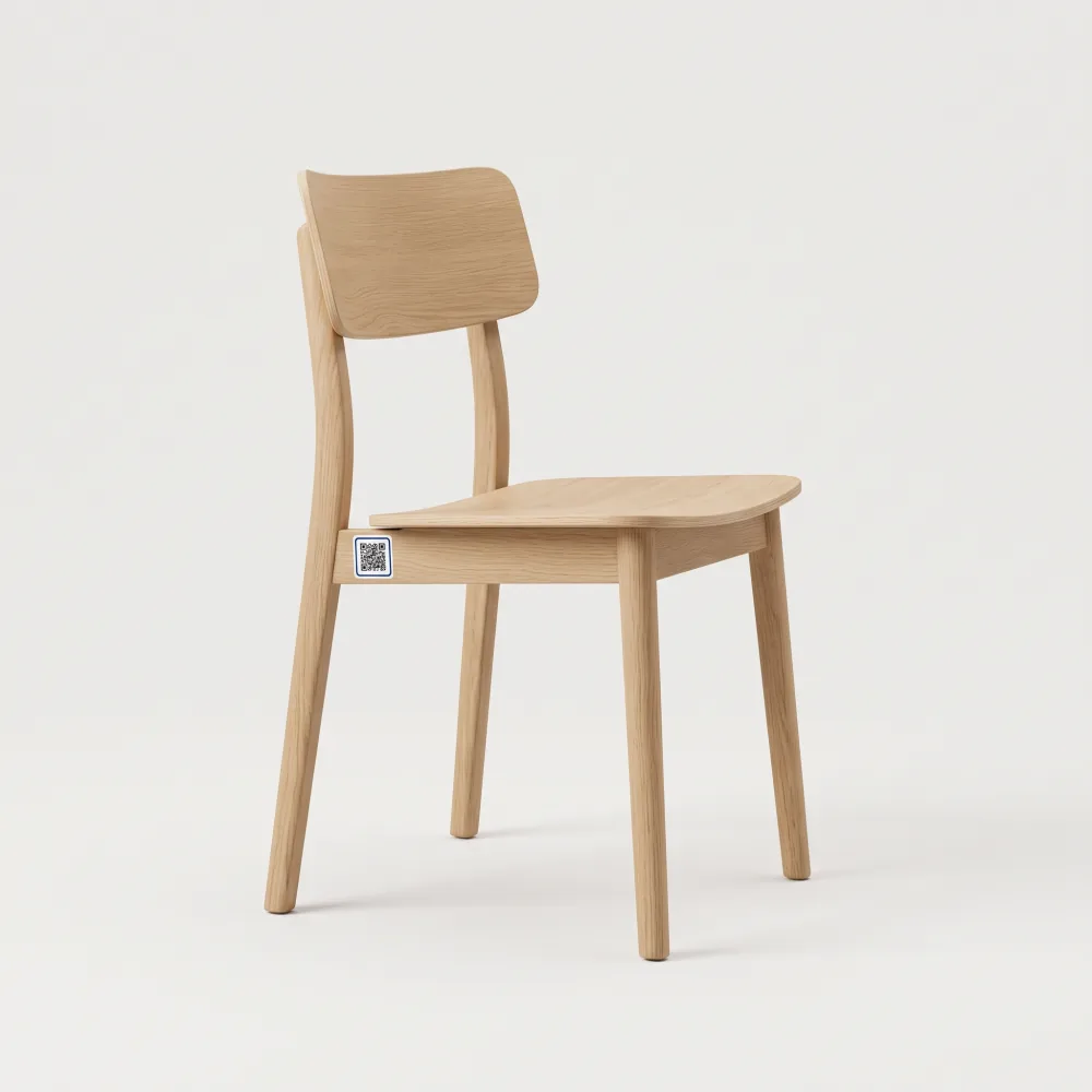 Oak chair with a digital product passport QR label on the seat rail